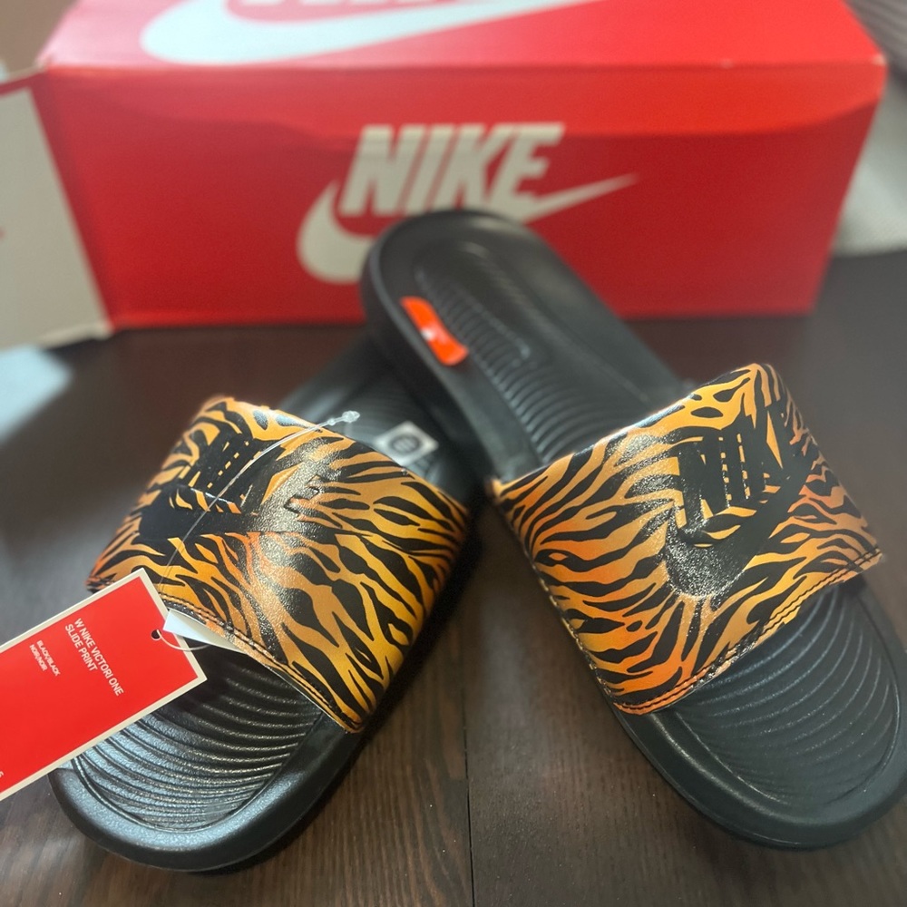 New women’s Nike slides size 11